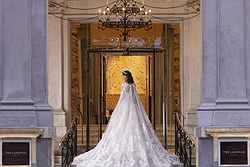 Bride at The Langham, London entrance